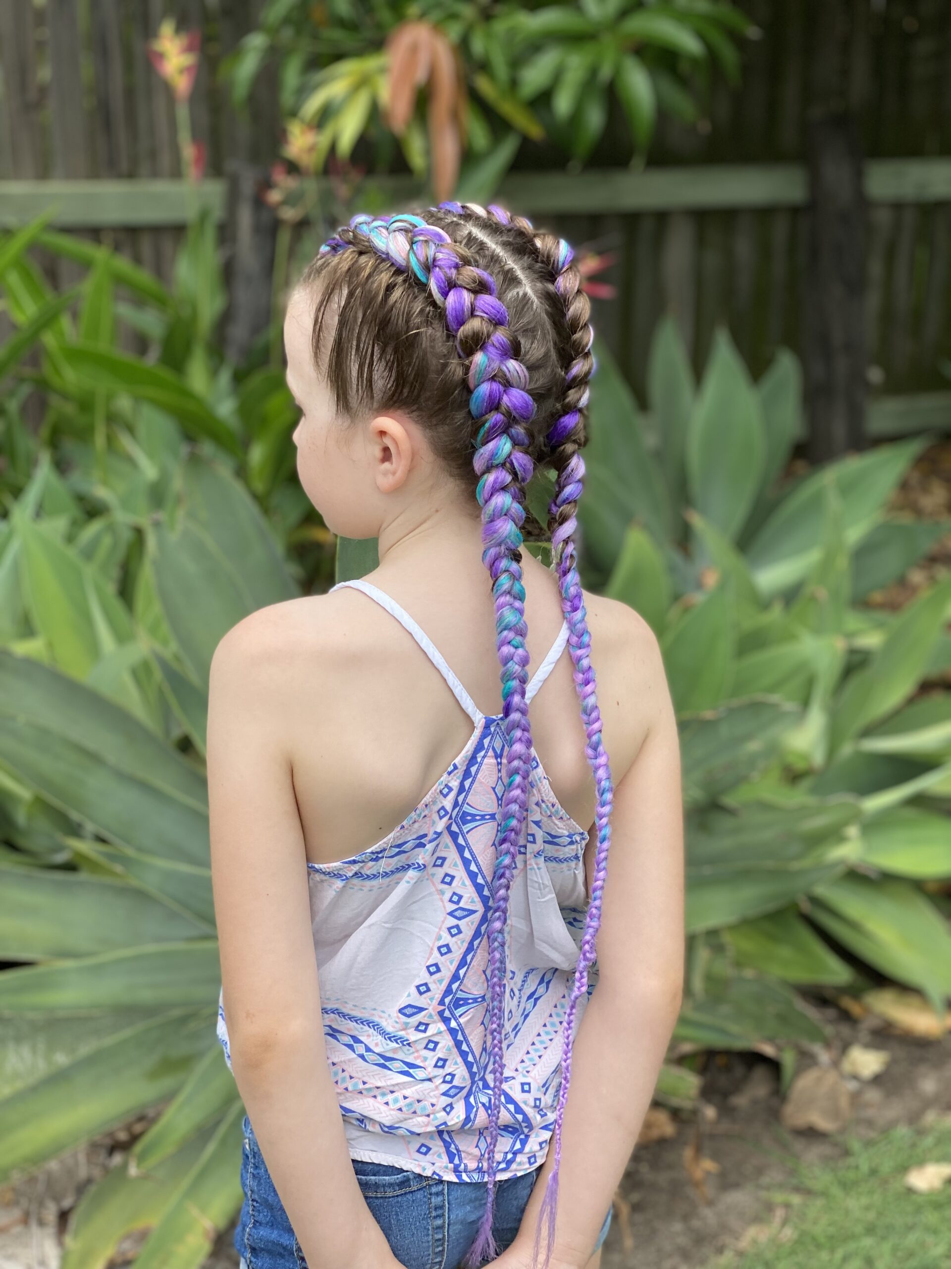 Girl with purple hair braid